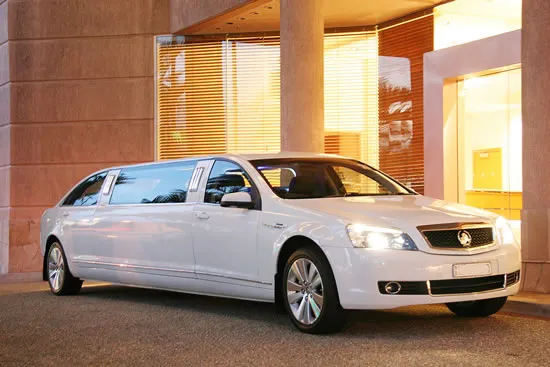 Brisbane airport limo hire with chauffeur meeting passengers on arrival